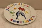 Porseleinen bord : met kunst aan tafel