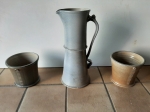 Kruik en potten in aardewerk