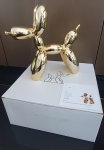 Balloon dog (gold).